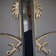 A security guard peers out of the Saudi consulate in Istanbul’s front doors on Oct. 10, 2018.